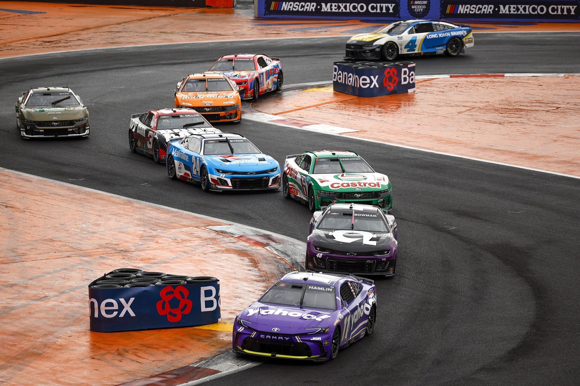 Ryan Truex, driver of the #11 Yahoo! Toyota, and Alex Bowman, driver of the #48 Ally Chevrolet, race during the Cup Series Viva Mexico 250 at Autodromo Hermanos Rodriguez - Source: Getty